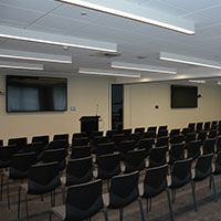 Rows of chairs set up for an event at the multi-purpose meeting room at Collins Square