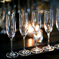 Wine glasses lined up in a row