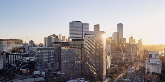 A view of the Collins Square precinct at sunset