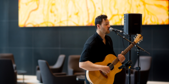 Live music performance held at Collins Square